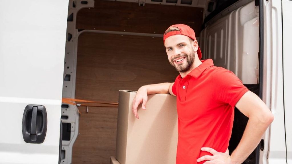 Image of man loading boxes into cargo van