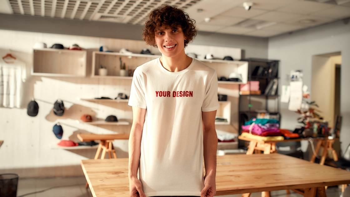 Image of man with tshirt saying your design