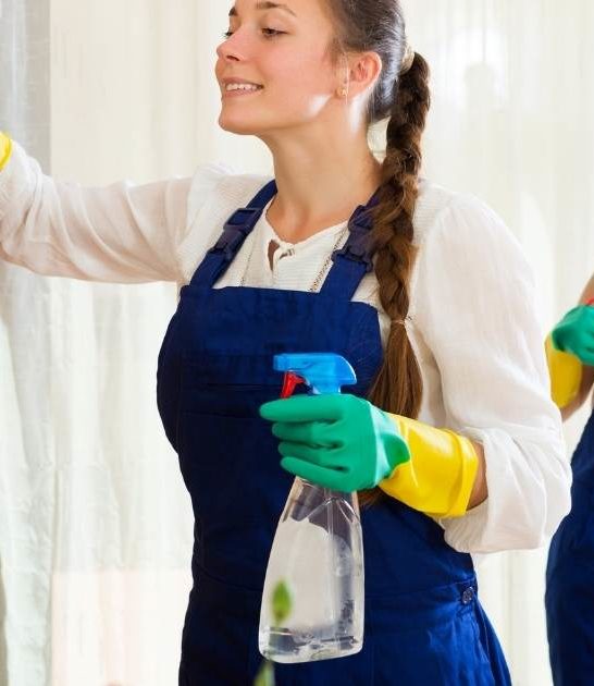how to start an airbnb cleaning business image of two women cleaning apartment