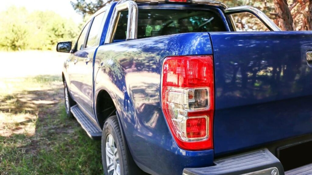 DOT regulations for sleeping in your pickup image of parked blue pickup